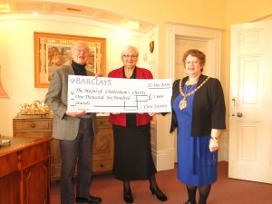 Presenting a cheque to the Mayor